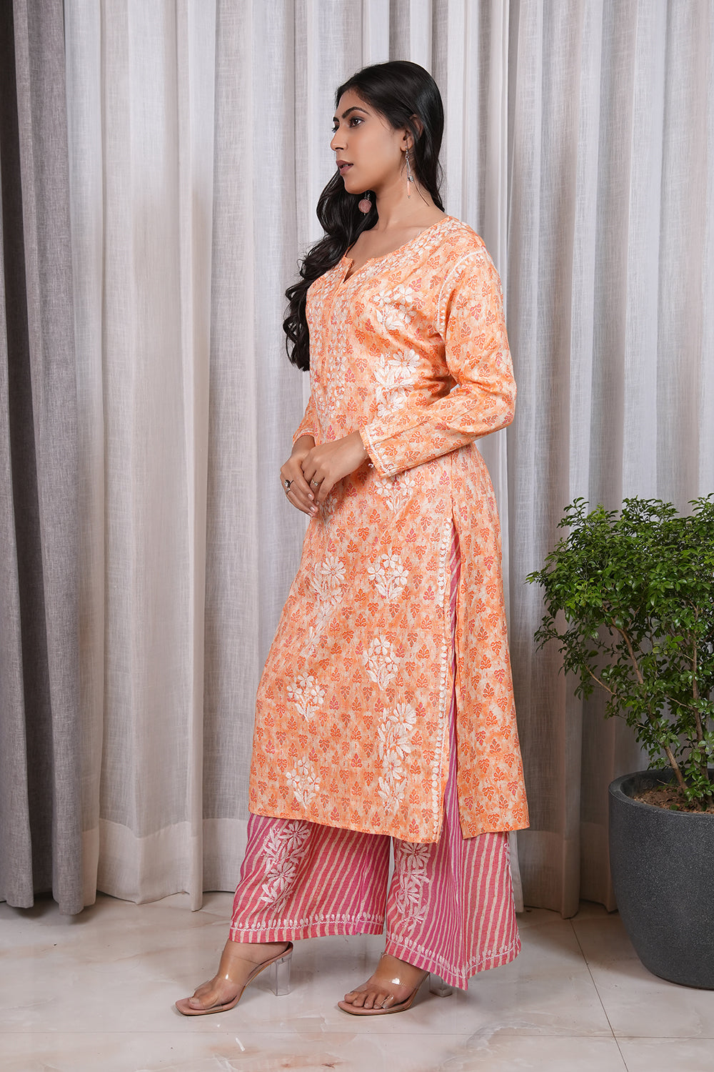 ORANGE PRINTED WITH CONTRAST PINK PLAZO SUIT